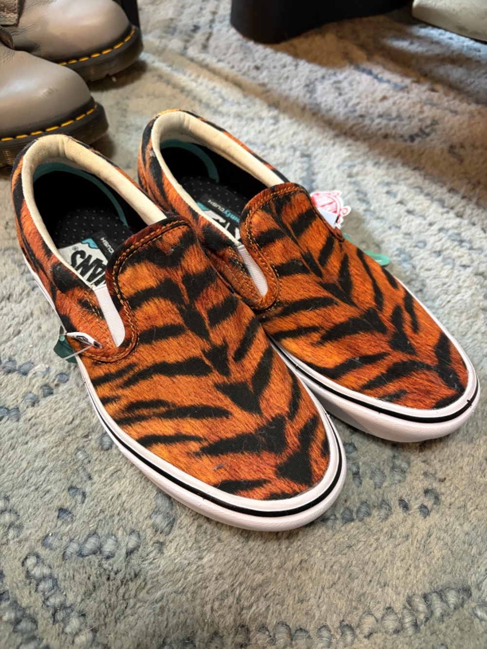 Vans Slip-On Tiger-Stripe Sneakers in Orange and Black